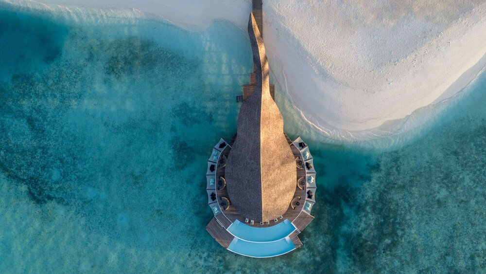 Aerial view of the resort with a central pool