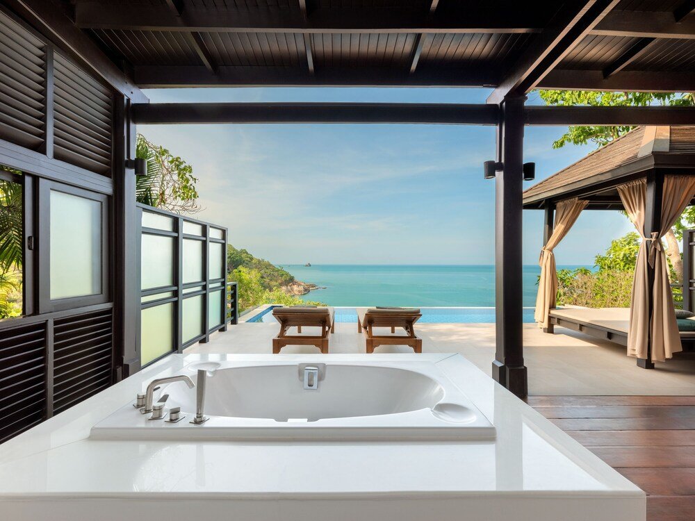 Modern bathroom with a large bathtub at Garrya Tongsai Bay