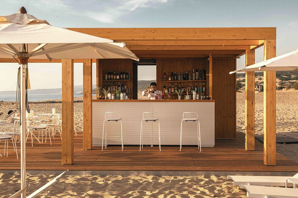 Wooden bar area with a view of the beach