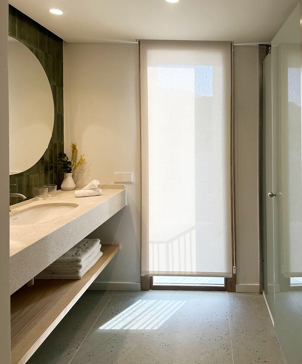 Modern bathroom with a large mirror