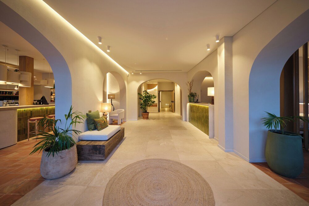 Modern hotel lobby with a central seating area
