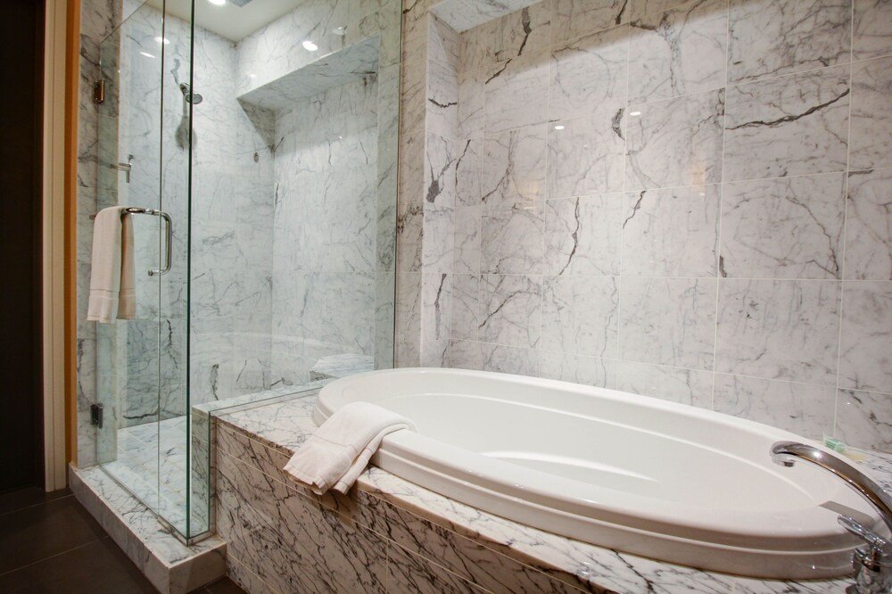 Modern bathroom with a marble shower enclosure