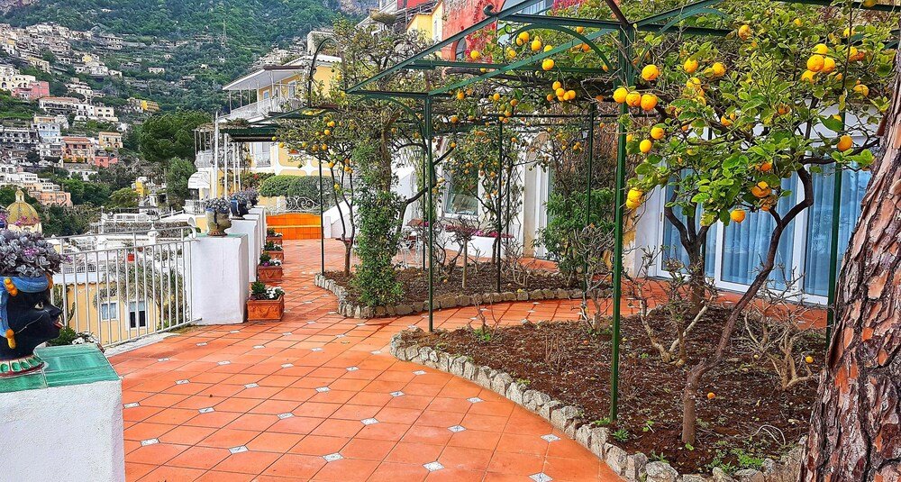 Terraced hillside with a pathway in Positano, Italy
