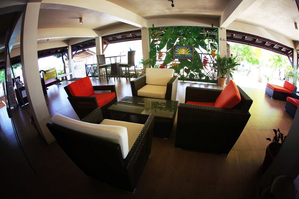 Spacious outdoor seating area with wicker furniture