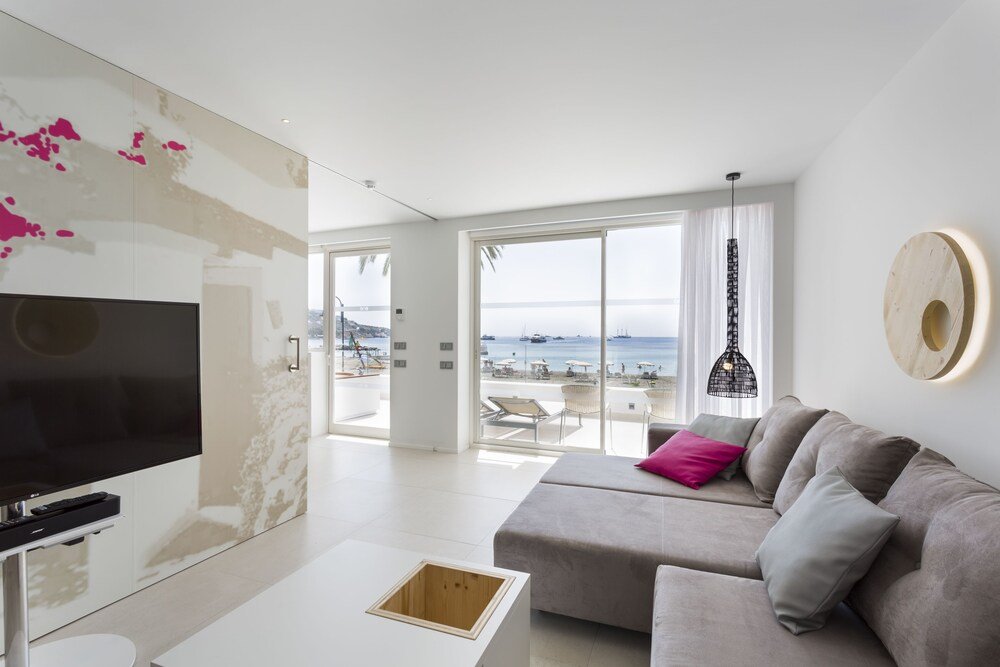 Modern living room with a large TV and a sofa