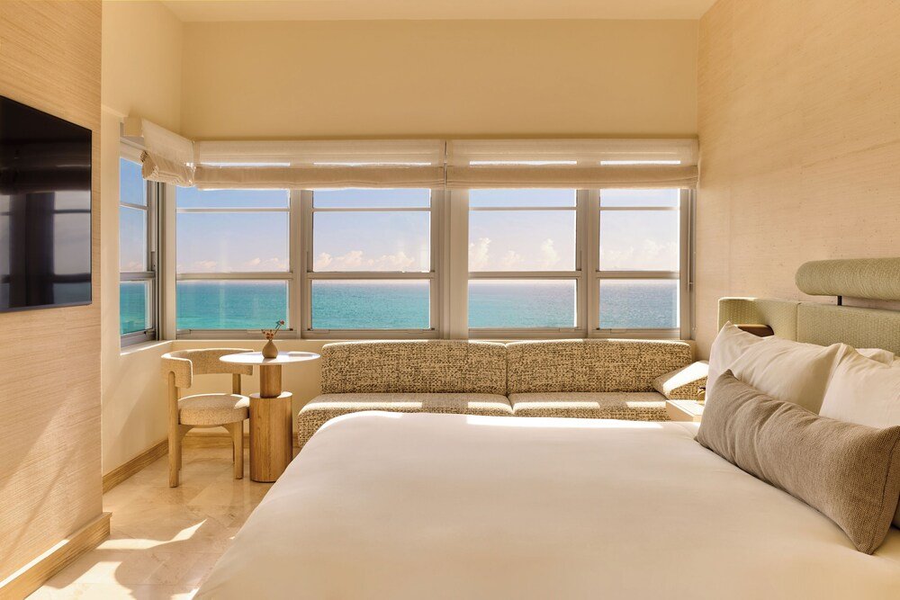 Hotel room with a large bed and a seating area