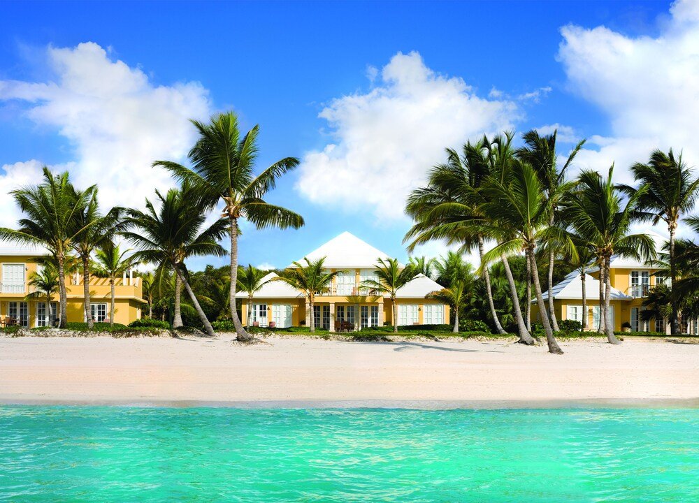 Beachfront hotel with several yellow buildings at Tortuga Bay Hotel, Punta Cana